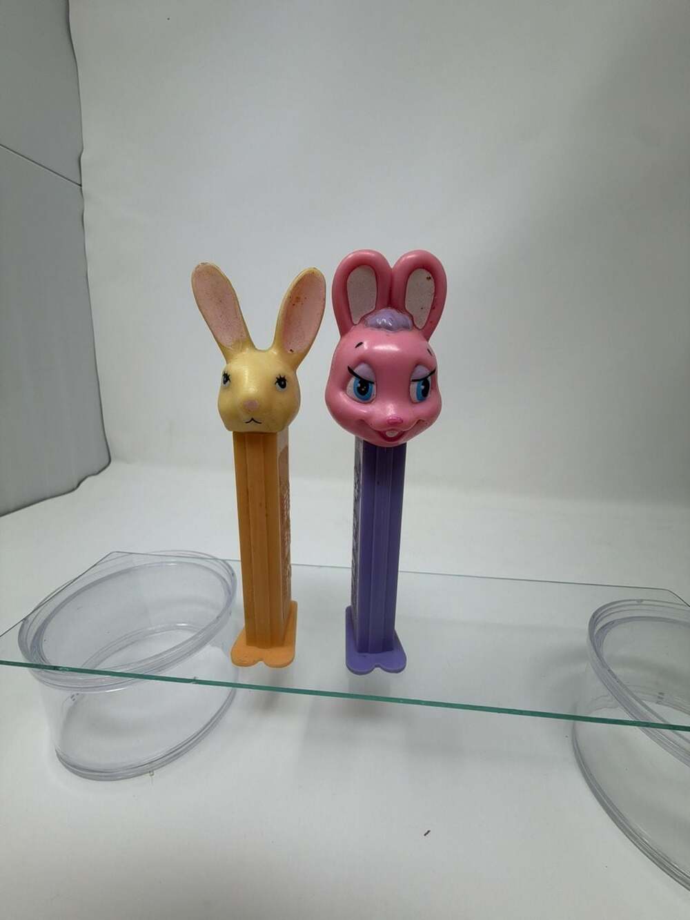 Lot of 2 Easter Bunny PEZ Candy Dispensers (Yellow/Orange and Pink/Purple)